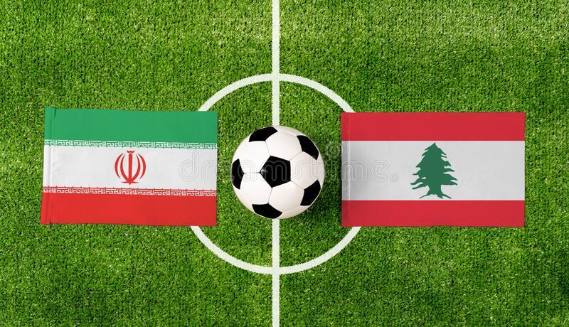 top view soccer ball iran vs lebanon flags match green football field 225518981